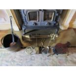 Collection of fireside effects including fire irons, trivet, bellows, coal scuttle, etc (tools only)
