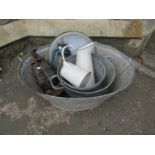 A vintage oval two handled galvanised bath and contents