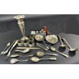 A mixed selection of silver including six napkin rings, a posy vase, tea strainer, paper knife,