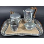 A large selection of loose and boxed silver plated flatware and Piqout Ware tea service with a tray.
