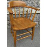 A Windsor style smokers elbow chair, principally in ash