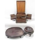 A 19th century Chinese hardwood travelling box with two swing out front compartments below a