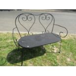 A light steel two seat garden bench with simple open scrollwork detail, 107 cm wide