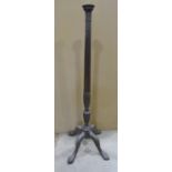 19th century mahogany torchere with turned and fluted column raised on a carved quadruped base, with