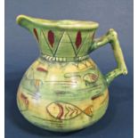 A Shorter Sons Sgraffito ware jug modelled by Mable Leigh showing fishes