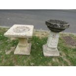 A small weathered cast composition stone two sectional sun dial with square dished top 44 cm high