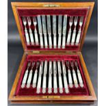 A Victorian mahogany boxed set of Mappin & Webb fruit knives and forks for twelve settings, all with