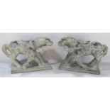 A pair of Tang inspired modern stone carved horse studies each with a stocky jockey.