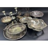 A mixed selection of silver plated table ware, including fruit bowls, a candelabra, a tazza,
