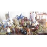 A large quantity of mainly Chinese and South East Asian soapstone, marble and wooden figurines of