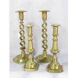 A pair of 19th century barley twist brass candlesticks 30cm high and another turned pair 22cm and