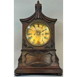 A Regency rosewood bracket clock with pagoda top, the casework with applied detail, enclosing a