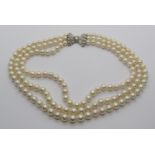 Three strand pearl necklace with 18ct white gold diamond clasp with slide action, pair of diamonds