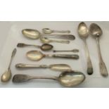 A mixed selection of 19th and 20th century silver pieces including two Georgian serving spoons, four