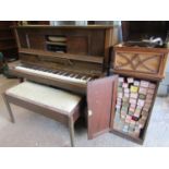 An Aeolian Company Pianola set in an oak case with iron frame, overstrung action, number 40420,