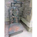 A set of Parnall & Sons Bristol cast iron sack scales, with decorative pierced back plate