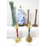 A selection of lamps, including a pair of reeded wood candlestick lamps, a red and green lamps