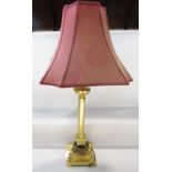 A brass classical reeded column table lamp, with a large pagoda shaped shade, 90cm including shade.