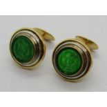 Pair of 18ct bi-colour cufflinks set with carved jade panels, 17.4g