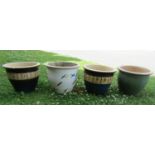 A set of three cast composition stone square tapered mock stone wall effect planters with painted