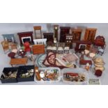 A collection of dolls house dining room / living room furnishings including tables, chairs,