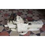 A heavy painted cast iron bench vice