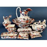 A collection of Amhurst Japan patterned toilet ware comprising a large jug and basin, toothpaste