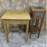 A vintage stained beechwood child's school desk with hinged lid and ink well, 57 cm wide x 46 cm