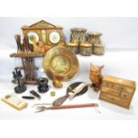 A box of wooden objects including a carved owl, hen, wrens, vases, canisters, a mantle clock,