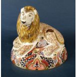 A Crown Derby figure of a lion at his feet a mouse set on an oval base, 16 cm in height (silver