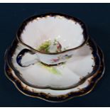 A George Jones tea service with exotic bird detail for twelve (with omissions) including muffin dish