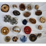 22 glass buttons circa 1940's including 7 buttons by Bimini incorporating distinct relief