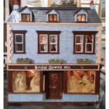 'Bridal Gowns etc'- an impressive and finely detailed period style dolls house shop comprising 3