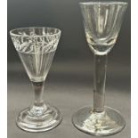A 19th century small round funnel wine glass on a plain stem and a 19th century engraved conical