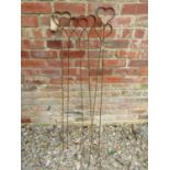 Six weathered steel heart shaped garden flower border stakes, 124cm high