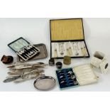 A selection of loose silver plated fish knives and forks, two box sets of six coffee spoons, a boxed