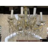 An eight branch cut glass chandelier with festoons and icicle drops, approx 60cm x 60cm (not
