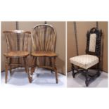 A good quality Windsor hoop and stick back dining chair with saddle shaped seat raised on turned