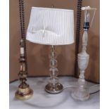 Three table lamps in brass, glass and timber