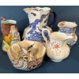 19th century Coalport jug with scroll handle and hand painted floral sprays, small Masons applique