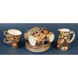 Six Copeland Spode coffee cans and saucers in a hand painted rich Imari pattern with further