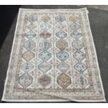 A Kazak Style Rug with four central columns in cool neutral tones 210 x 165 cm