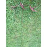 Three ornamental steel garden flower border stakes with floating swallow finials