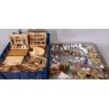 A large collection of dolls house furnishings comprising kitchen related furniture, foods and