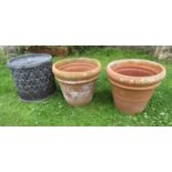 A pair of weathered terracotta outsized flower pots with moulded rims, approx 50 cm diameter x 42 cm