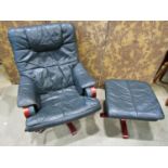 A Stressless style swivel and adjustable lounge chair and matching footstool raised on five splay