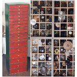 A substantial collection of 19th-20th century decorative and military buttons displayed in a