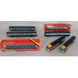 Inter-city rail models comprising 2 x Hornby class 43 locomotives (43010 and W43002), 2 coaches, a