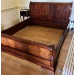 A good quality contemporary mahogany sleigh bed with freestanding double base units together with