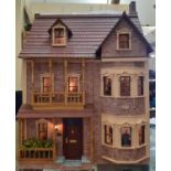 'The Grand House'- a 3 storey period style dolls house with red brick effect front dated 1871, front